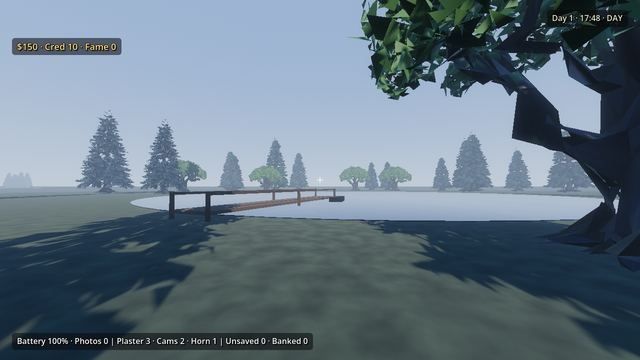 A broad oak and a wooden dock at a lake